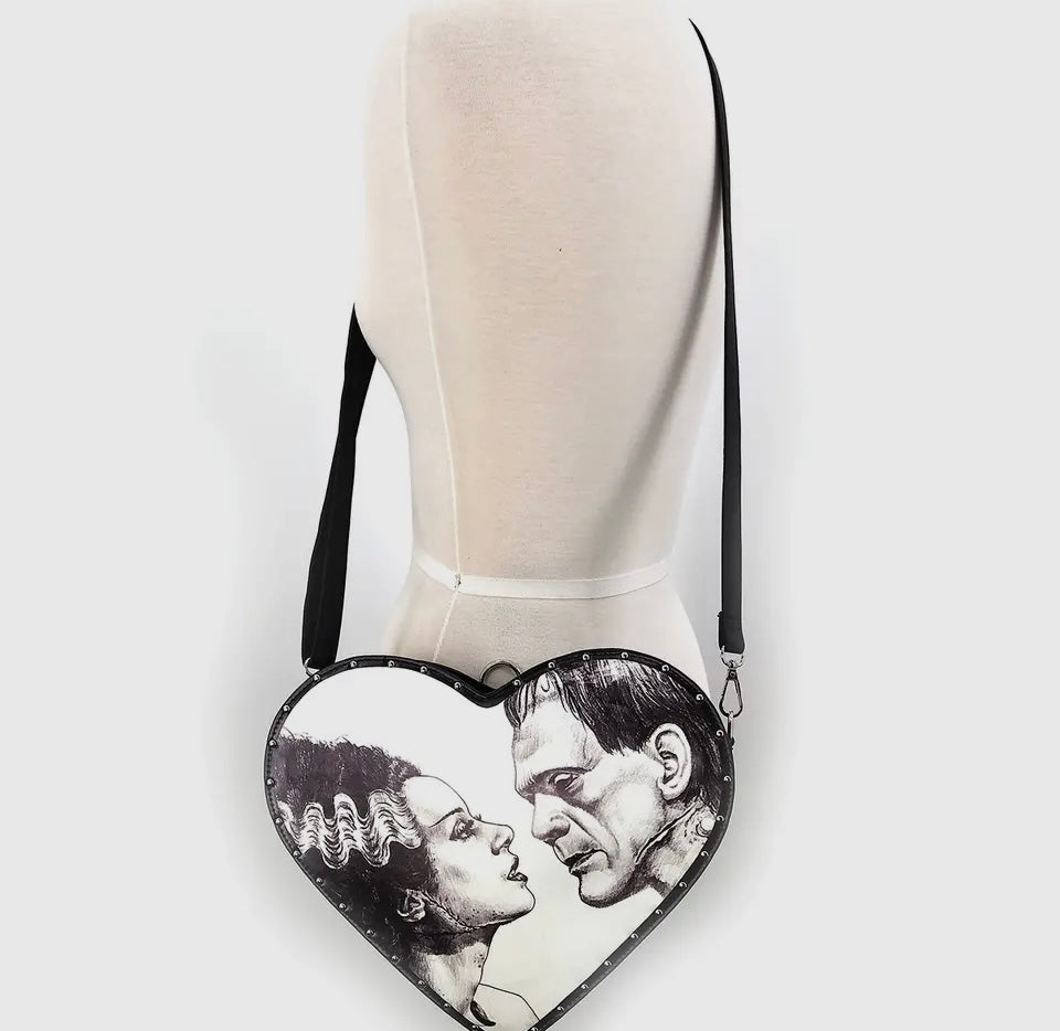 
                  
                    Glow in the Dark Heart Shape Frankenstein and Bride Dual Purse
                  
                