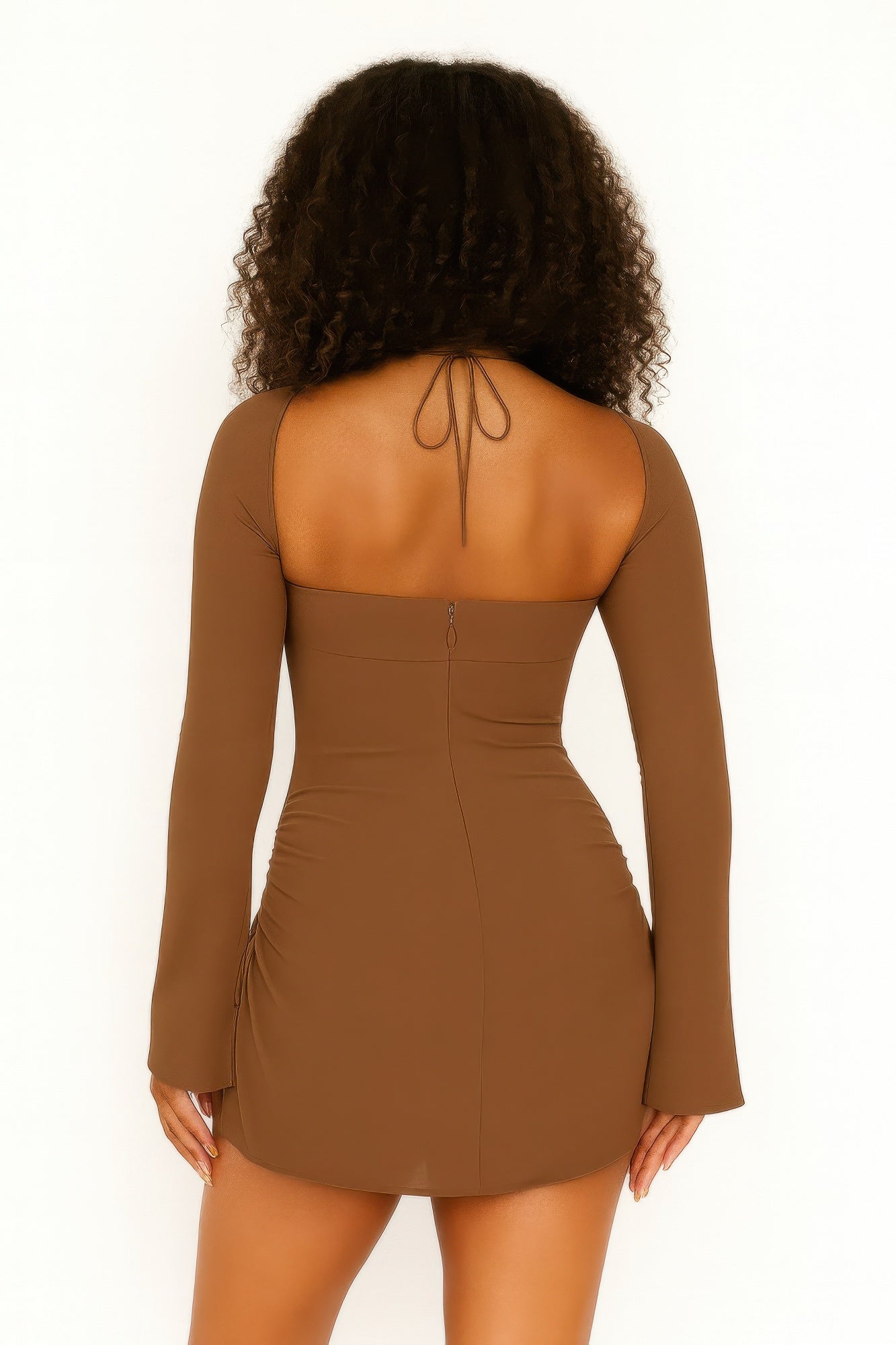 Rear view of the chocolate brown mini dress showing the open square back, zipper closure, and fitted silhouette with adjustable side ruching. Denver, Colorado USA.