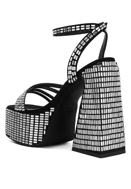 A rear three-quarter view of the black platform sandal, highlighting the dramatic height and wide coverage of the mirror-embellished block heel and thick platform. Available from CO-Wear in Denver, Colorado USA.