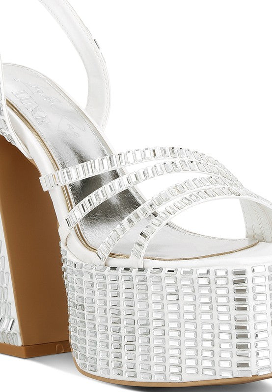 A close-up view of the white platform sandal, focusing on the densely packed square mirror embellishments covering the thick platform and the wide straps over the toe. Available from CO-Wear in Denver, Colorado USA.