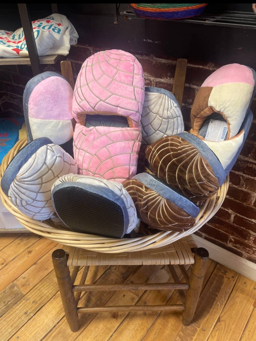 Colorful UNISEX slippers arranged in a wicker basket. Pick up available in Denver Colorado and we also ship nationwide.