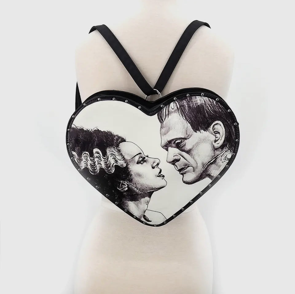 
                  
                    Glow in the Dark Heart Shape Frankenstein and Bride Dual Purse
                  
                