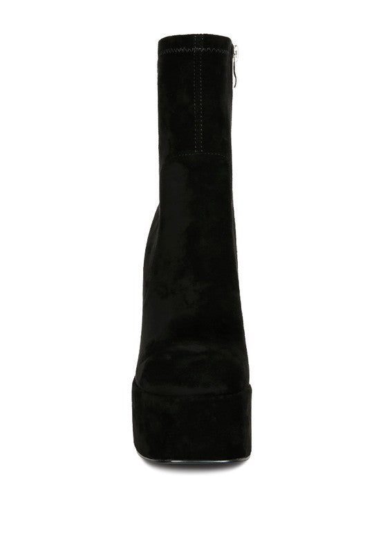 A straight-on front view of the black microfiber ankle boot, highlighting the tall, elasticized shaft and the chunky, seamless platform sole. This boot is available from CO-Wear in Denver, Colorado USA.