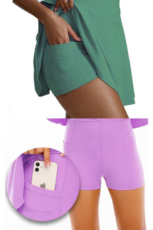 Close-up view showcasing the pocket detail of a green tennis skort dress. A hand is inserted into the pocket, revealing the built-in shorts underneath the skirt overlay. Another inset image shows a phone inside the pocket of a purple version of the skort dress.