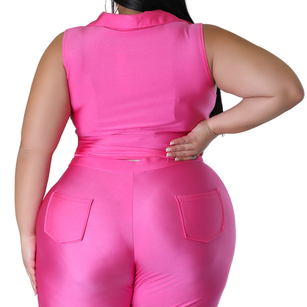
                  
                    Person wearing a bright pink sleeveless 2 piece set  on a plain background
                  
                