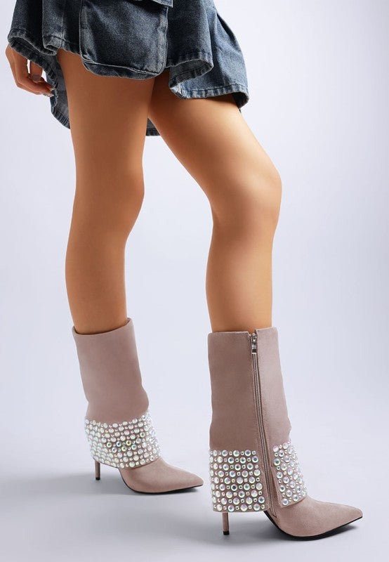A model's legs are shown wearing nude (light brown) suede stiletto boots with a wide cuff, zipper, pointed toe, and iridescent diamante embellishments around the ankle. Available from CO-Wear in Denver, Colorado USA.