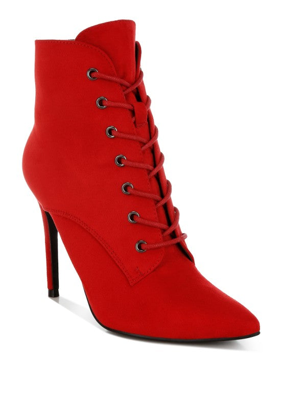 A side view of a red microfiber ankle boot with a high stiletto heel and full lace-up front with metal grommets. This boot is available from CO-Wear in Denver, Colorado USA.