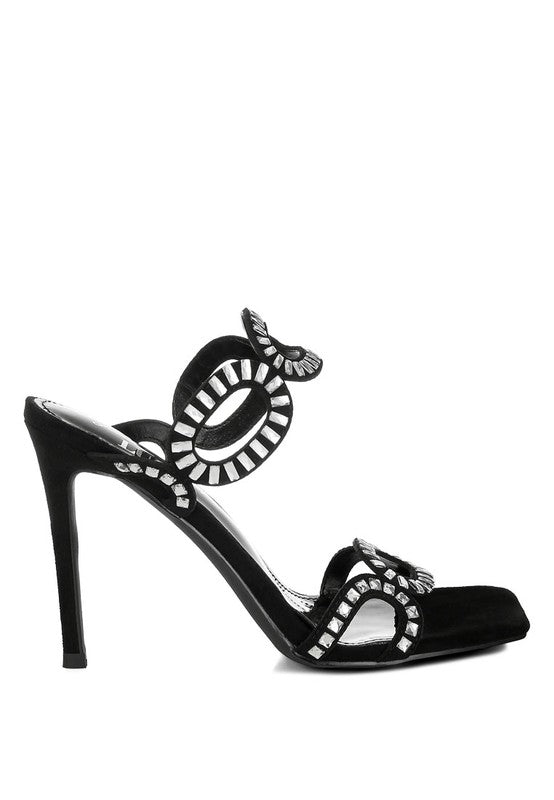A side profile of the black stiletto heel sandal, clearly showing the thin heel and the ornate circular rhinestone cut-out design on the straps. This shoe is available from CO-Wear in Denver, Colorado USA.
