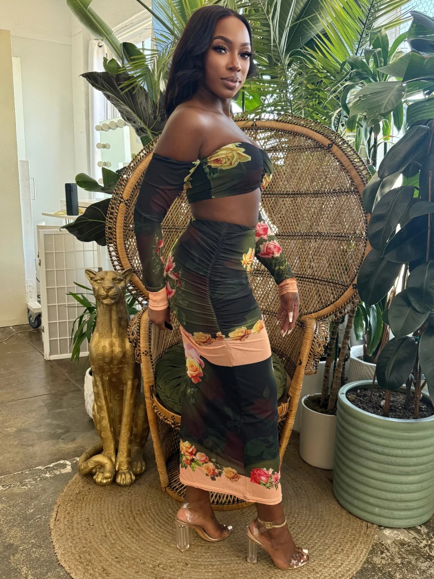 Side view of the model wearing the Eden Rose Mesh Set with a sheer floral long-sleeve crop top and matching ruched midi skirt. Denver, Colorado USA.