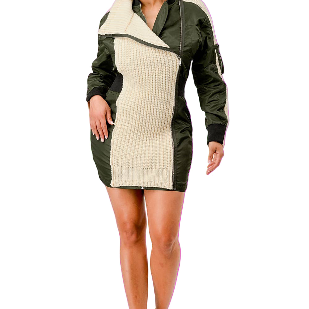 Woman wearing a green and beige dress with a hood on a white background