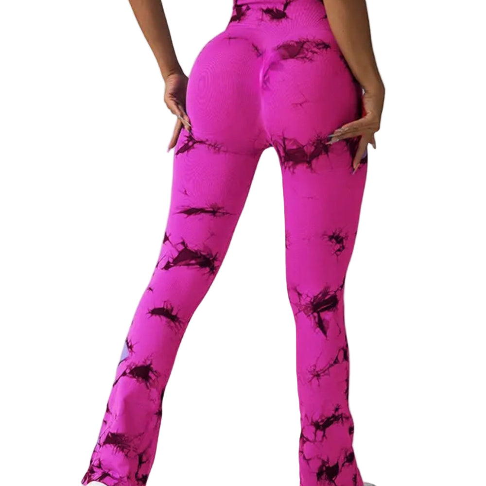 Person wearing pink tie-dye leggings on a plain background